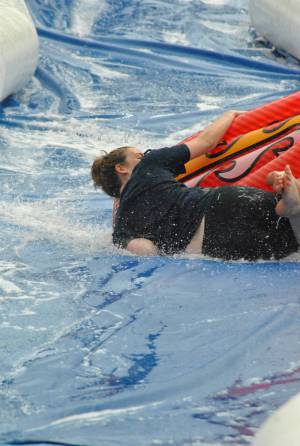 Ilminster Town FC fun day Part 20 – July 9, 2016: A giant water slide was the star attraction at a family fun day held to celebrate Ilminster Town Football Club’s new Archie Gooch Pavilion headquarters in Britten’s Field. Photo 18