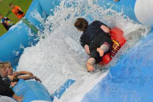 Ilminster Town FC fun day Part 20 – July 9, 2016: A giant water slide was the star attraction at a family fun day held to celebrate Ilminster Town Football Club’s new Archie Gooch Pavilion headquarters in Britten’s Field. Photo 22