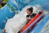 Ilminster Town FC fun day Part 20 – July 9, 2016: A giant water slide was the star attraction at a family fun day held to celebrate Ilminster Town Football Club’s new Archie Gooch Pavilion headquarters in Britten’s Field. Photo 24