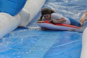Ilminster Town FC fun day Part 20 – July 9, 2016: A giant water slide was the star attraction at a family fun day held to celebrate Ilminster Town Football Club’s new Archie Gooch Pavilion headquarters in Britten’s Field. Photo 25