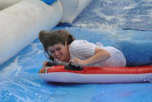 Ilminster Town FC fun day Part 20 – July 9, 2016: A giant water slide was the star attraction at a family fun day held to celebrate Ilminster Town Football Club’s new Archie Gooch Pavilion headquarters in Britten’s Field. Photo 26