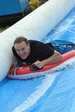 Ilminster Town FC fun day Part 20 – July 9, 2016: A giant water slide was the star attraction at a family fun day held to celebrate Ilminster Town Football Club’s new Archie Gooch Pavilion headquarters in Britten’s Field. Photo 2