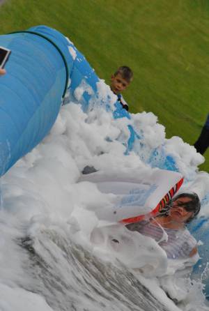 Ilminster Town FC fun day Part 20 – July 9, 2016: A giant water slide was the star attraction at a family fun day held to celebrate Ilminster Town Football Club’s new Archie Gooch Pavilion headquarters in Britten’s Field. Photo 30