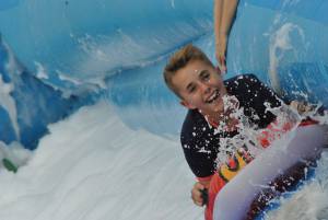 Ilminster Town FC fun day Part 20 – July 9, 2016: A giant water slide was the star attraction at a family fun day held to celebrate Ilminster Town Football Club’s new Archie Gooch Pavilion headquarters in Britten’s Field. Photo 8