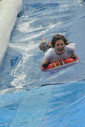 Ilminster Town FC fun day Part 21 – July 9, 2016: A giant water slide was the star attraction at a family fun day held to celebrate Ilminster Town Football Club’s new Archie Gooch Pavilion headquarters in Britten’s Field. Photo 11