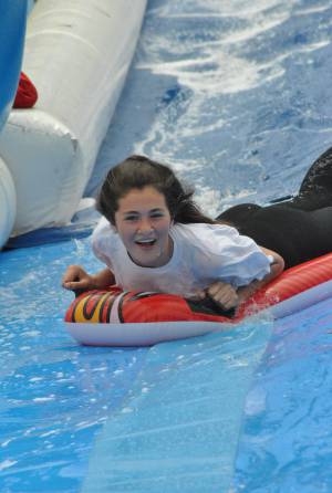 Ilminster Town FC fun day Part 21 – July 9, 2016: A giant water slide was the star attraction at a family fun day held to celebrate Ilminster Town Football Club’s new Archie Gooch Pavilion headquarters in Britten’s Field. Photo 12