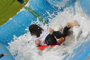Ilminster Town FC fun day Part 21 – July 9, 2016: A giant water slide was the star attraction at a family fun day held to celebrate Ilminster Town Football Club’s new Archie Gooch Pavilion headquarters in Britten’s Field. Photo 14