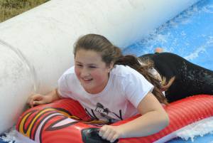 Ilminster Town FC fun day Part 21 – July 9, 2016: A giant water slide was the star attraction at a family fun day held to celebrate Ilminster Town Football Club’s new Archie Gooch Pavilion headquarters in Britten’s Field. Photo 18