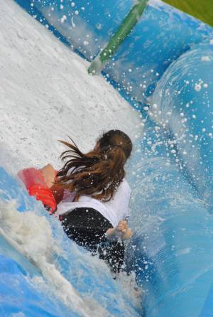 Ilminster Town FC fun day Part 21 – July 9, 2016: A giant water slide was the star attraction at a family fun day held to celebrate Ilminster Town Football Club’s new Archie Gooch Pavilion headquarters in Britten’s Field. Photo 19