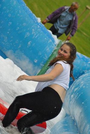 Ilminster Town FC fun day Part 21 – July 9, 2016: A giant water slide was the star attraction at a family fun day held to celebrate Ilminster Town Football Club’s new Archie Gooch Pavilion headquarters in Britten’s Field. Photo 20