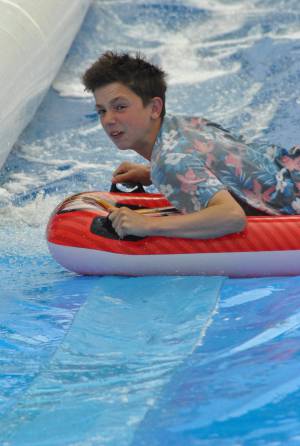 Ilminster Town FC fun day Part 21 – July 9, 2016: A giant water slide was the star attraction at a family fun day held to celebrate Ilminster Town Football Club’s new Archie Gooch Pavilion headquarters in Britten’s Field. Photo 23