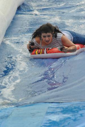 Ilminster Town FC fun day Part 21 – July 9, 2016: A giant water slide was the star attraction at a family fun day held to celebrate Ilminster Town Football Club’s new Archie Gooch Pavilion headquarters in Britten’s Field. Photo 25