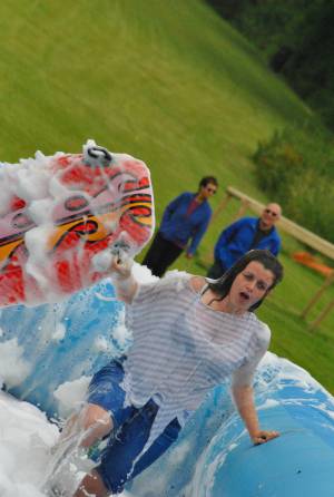 Ilminster Town FC fun day Part 21 – July 9, 2016: A giant water slide was the star attraction at a family fun day held to celebrate Ilminster Town Football Club’s new Archie Gooch Pavilion headquarters in Britten’s Field. Photo 2