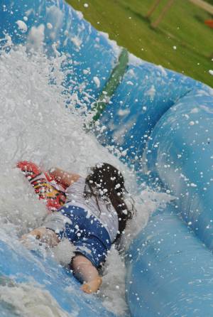 Ilminster Town FC fun day Part 21 – July 9, 2016: A giant water slide was the star attraction at a family fun day held to celebrate Ilminster Town Football Club’s new Archie Gooch Pavilion headquarters in Britten’s Field. Photo 28