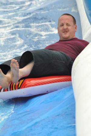 Ilminster Town FC fun day Part 21 – July 9, 2016: A giant water slide was the star attraction at a family fun day held to celebrate Ilminster Town Football Club’s new Archie Gooch Pavilion headquarters in Britten’s Field. Photo 4