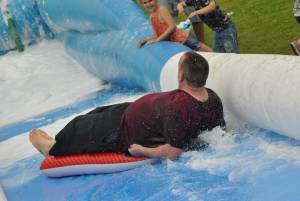 Ilminster Town FC fun day Part 21 – July 9, 2016: A giant water slide was the star attraction at a family fun day held to celebrate Ilminster Town Football Club’s new Archie Gooch Pavilion headquarters in Britten’s Field. Photo 6