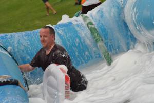 Ilminster Town FC fun day Part 21 – July 9, 2016: A giant water slide was the star attraction at a family fun day held to celebrate Ilminster Town Football Club’s new Archie Gooch Pavilion headquarters in Britten’s Field. Photo 9