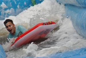 Ilminster Town FC fun day Part 22 – July 9, 2016: A giant water slide was the star attraction at a family fun day held to celebrate Ilminster Town Football Club’s new Archie Gooch Pavilion headquarters in Britten’s Field. Photo 10