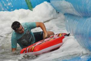 Ilminster Town FC fun day Part 22 – July 9, 2016: A giant water slide was the star attraction at a family fun day held to celebrate Ilminster Town Football Club’s new Archie Gooch Pavilion headquarters in Britten’s Field. Photo 11