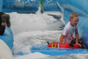 Ilminster Town FC fun day Part 22 – July 9, 2016: A giant water slide was the star attraction at a family fun day held to celebrate Ilminster Town Football Club’s new Archie Gooch Pavilion headquarters in Britten’s Field. Photo 20