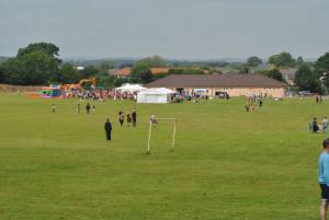 Ilminster Town FC fun day Part 23 – July 9, 2016: A giant water slide was the star attraction at a family fun day held to celebrate Ilminster Town Football Club’s new Archie Gooch Pavilion headquarters in Britten’s Field. Photo 11