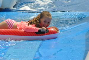 Ilminster Town FC fun day Part 23 – July 9, 2016: A giant water slide was the star attraction at a family fun day held to celebrate Ilminster Town Football Club’s new Archie Gooch Pavilion headquarters in Britten’s Field. Photo 20