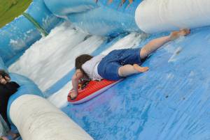 Ilminster Town FC fun day Part 23 – July 9, 2016: A giant water slide was the star attraction at a family fun day held to celebrate Ilminster Town Football Club’s new Archie Gooch Pavilion headquarters in Britten’s Field. Photo 3