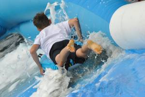 Ilminster Town FC fun day Part 24 – July 9, 2016: A giant water slide was the star attraction at a family fun day held to celebrate Ilminster Town Football Club’s new Archie Gooch Pavilion headquarters in Britten’s Field. Photo 23