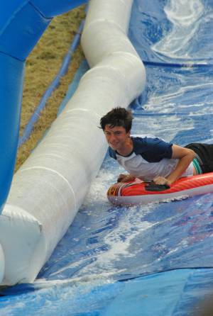 Ilminster Town FC fun day Part 24 – July 9, 2016: A giant water slide was the star attraction at a family fun day held to celebrate Ilminster Town Football Club’s new Archie Gooch Pavilion headquarters in Britten’s Field. Photo 25