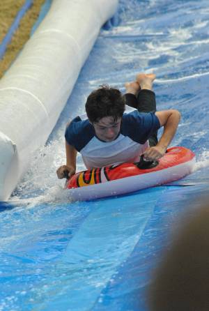 Ilminster Town FC fun day Part 24 – July 9, 2016: A giant water slide was the star attraction at a family fun day held to celebrate Ilminster Town Football Club’s new Archie Gooch Pavilion headquarters in Britten’s Field. Photo 26