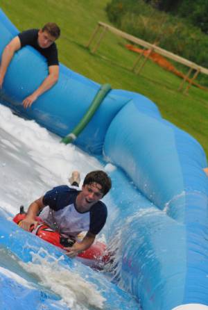 Ilminster Town FC fun day Part 24 – July 9, 2016: A giant water slide was the star attraction at a family fun day held to celebrate Ilminster Town Football Club’s new Archie Gooch Pavilion headquarters in Britten’s Field. Photo 29