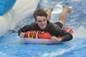 Ilminster Town FC fun day Part 25 – July 9, 2016: A giant water slide was the star attraction at a family fun day held to celebrate Ilminster Town Football Club’s new Archie Gooch Pavilion headquarters in Britten’s Field. Photo 24