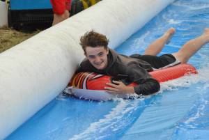 Ilminster Town FC fun day Part 25 – July 9, 2016: A giant water slide was the star attraction at a family fun day held to celebrate Ilminster Town Football Club’s new Archie Gooch Pavilion headquarters in Britten’s Field. Photo 25
