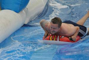 Ilminster Town FC fun day Part 25 – July 9, 2016: A giant water slide was the star attraction at a family fun day held to celebrate Ilminster Town Football Club’s new Archie Gooch Pavilion headquarters in Britten’s Field. Photo 28