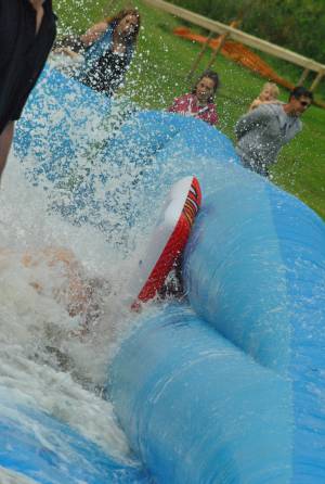 Ilminster Town FC fun day Part 25 – July 9, 2016: A giant water slide was the star attraction at a family fun day held to celebrate Ilminster Town Football Club’s new Archie Gooch Pavilion headquarters in Britten’s Field. Photo 5