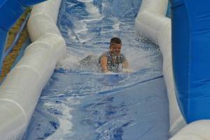Ilminster Town FC fun day Part 25 – July 9, 2016: A giant water slide was the star attraction at a family fun day held to celebrate Ilminster Town Football Club’s new Archie Gooch Pavilion headquarters in Britten’s Field. Photo 8