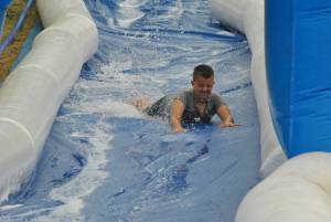 Ilminster Town FC fun day Part 25 – July 9, 2016: A giant water slide was the star attraction at a family fun day held to celebrate Ilminster Town Football Club’s new Archie Gooch Pavilion headquarters in Britten’s Field. Photo 9