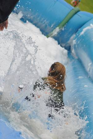 Ilminster Town FC fun day Part 26 – July 9, 2016: A giant water slide was the star attraction at a family fun day held to celebrate Ilminster Town Football Club’s new Archie Gooch Pavilion headquarters in Britten’s Field. Photo 10