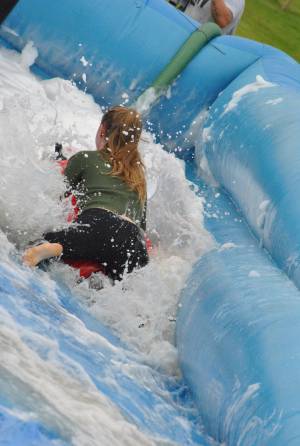 Ilminster Town FC fun day Part 26 – July 9, 2016: A giant water slide was the star attraction at a family fun day held to celebrate Ilminster Town Football Club’s new Archie Gooch Pavilion headquarters in Britten’s Field. Photo 11