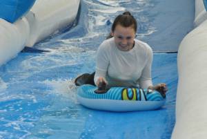 Ilminster Town FC fun day Part 26 – July 9, 2016: A giant water slide was the star attraction at a family fun day held to celebrate Ilminster Town Football Club’s new Archie Gooch Pavilion headquarters in Britten’s Field. Photo 13