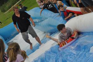 Ilminster Town FC fun day Part 26 – July 9, 2016: A giant water slide was the star attraction at a family fun day held to celebrate Ilminster Town Football Club’s new Archie Gooch Pavilion headquarters in Britten’s Field. Photo 5