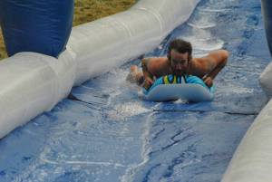 Ilminster Town FC fun day Part 27 – July 9, 2016: A giant water slide was the star attraction at a family fun day held to celebrate Ilminster Town Football Club’s new Archie Gooch Pavilion headquarters in Britten’s Field. Photo 13