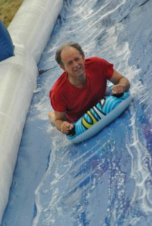 Ilminster Town FC fun day Part 27 – July 9, 2016: A giant water slide was the star attraction at a family fun day held to celebrate Ilminster Town Football Club’s new Archie Gooch Pavilion headquarters in Britten’s Field. Photo 15