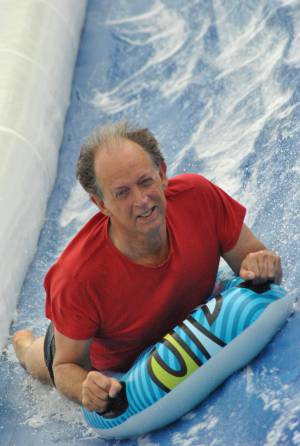 Ilminster Town FC fun day Part 27 – July 9, 2016: A giant water slide was the star attraction at a family fun day held to celebrate Ilminster Town Football Club’s new Archie Gooch Pavilion headquarters in Britten’s Field. Photo 16