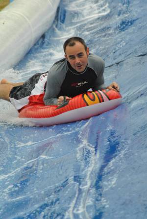 Ilminster Town FC fun day Part 27 – July 9, 2016: A giant water slide was the star attraction at a family fun day held to celebrate Ilminster Town Football Club’s new Archie Gooch Pavilion headquarters in Britten’s Field. Photo 17