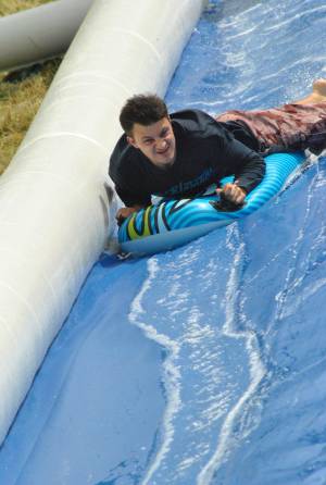 Ilminster Town FC fun day Part 28 – July 9, 2016: A giant water slide was the star attraction at a family fun day held to celebrate Ilminster Town Football Club’s new Archie Gooch Pavilion headquarters in Britten’s Field. Photo 11