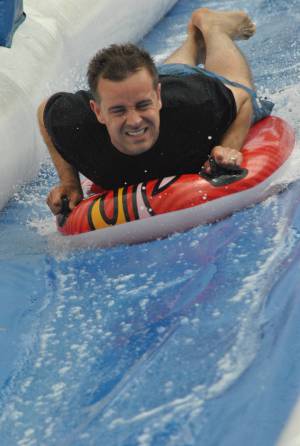 Ilminster Town FC fun day Part 28 – July 9, 2016: A giant water slide was the star attraction at a family fun day held to celebrate Ilminster Town Football Club’s new Archie Gooch Pavilion headquarters in Britten’s Field. Photo 21