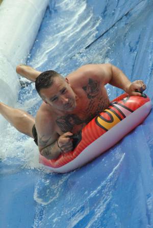 Ilminster Town FC fun day Part 28 – July 9, 2016: A giant water slide was the star attraction at a family fun day held to celebrate Ilminster Town Football Club’s new Archie Gooch Pavilion headquarters in Britten’s Field. Photo 22