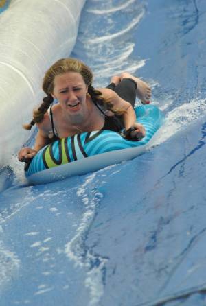 Ilminster Town FC fun day Part 28 – July 9, 2016: A giant water slide was the star attraction at a family fun day held to celebrate Ilminster Town Football Club’s new Archie Gooch Pavilion headquarters in Britten’s Field. Photo 23