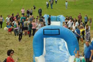 Ilminster Town FC fun day Part 28 – July 9, 2016: A giant water slide was the star attraction at a family fun day held to celebrate Ilminster Town Football Club’s new Archie Gooch Pavilion headquarters in Britten’s Field. Photo 26